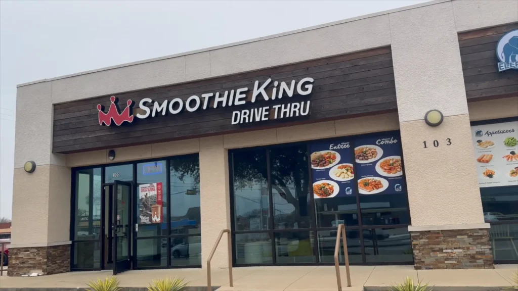 Smoothie King Strawberry Guava Refresher with feedback survey on smartphone
